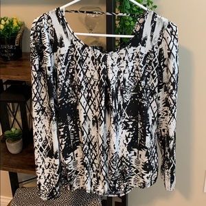 Black and white long sleeved patterned blouse